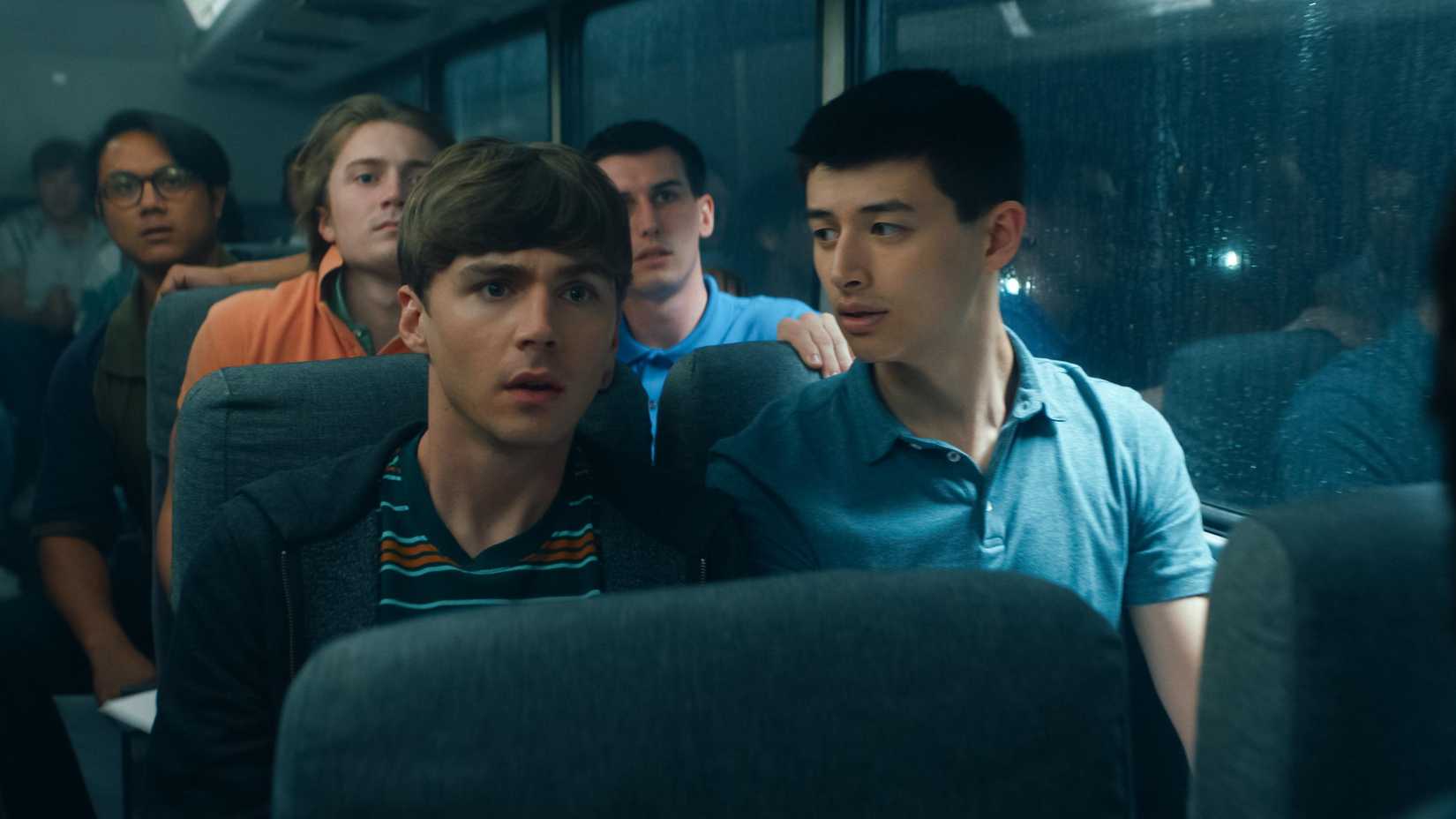 Cam and Ray sit on the bus in Boots