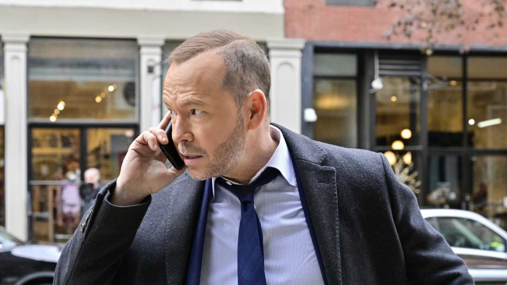 Donnie Wahlberg in Boston Blue talking on his cell phone