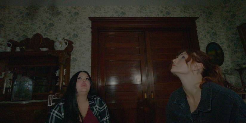 The two main characters of House on Eden stare at the ceiling