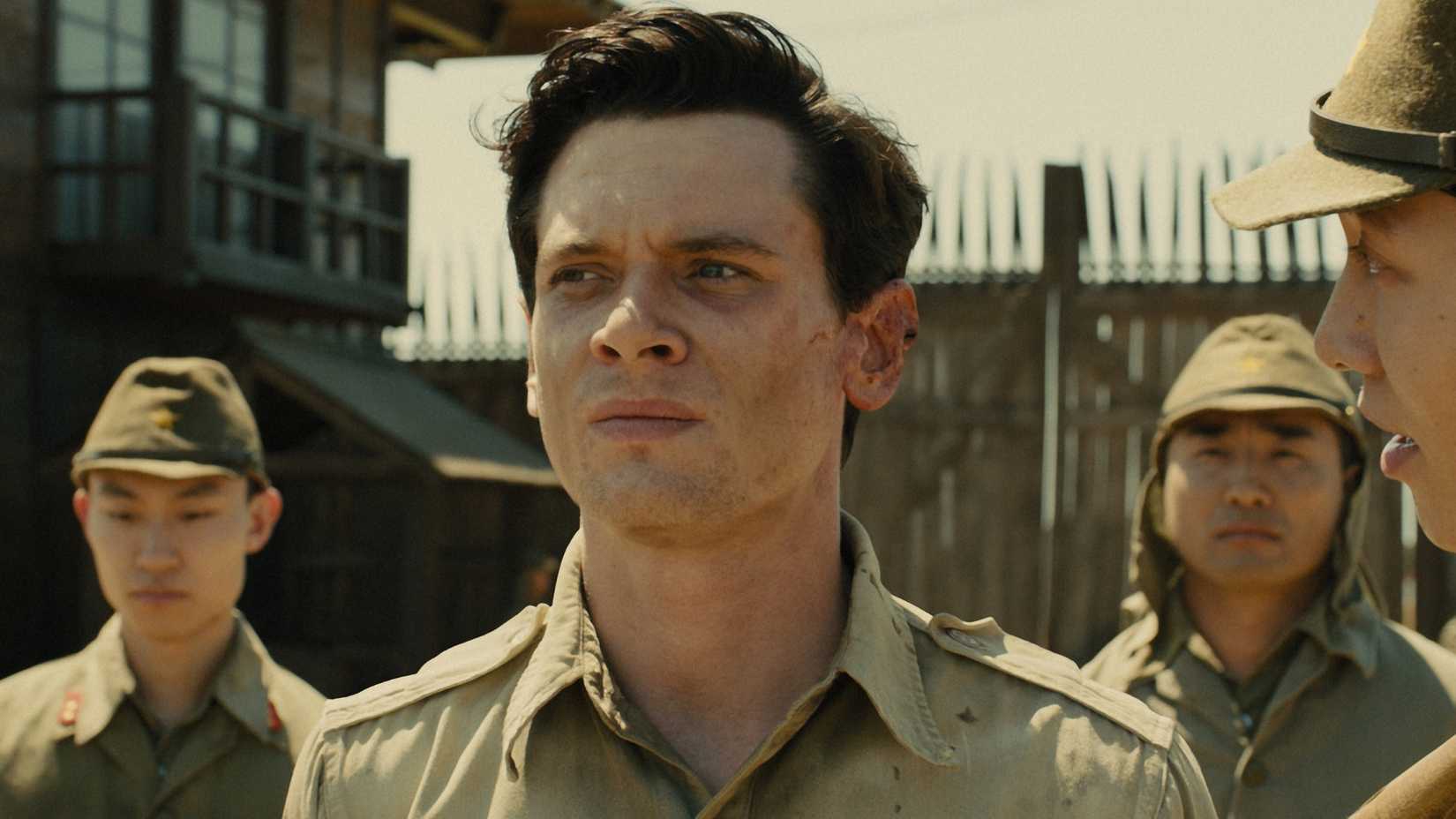 Jack O'Connell as Louis Zamperini in Unbroken