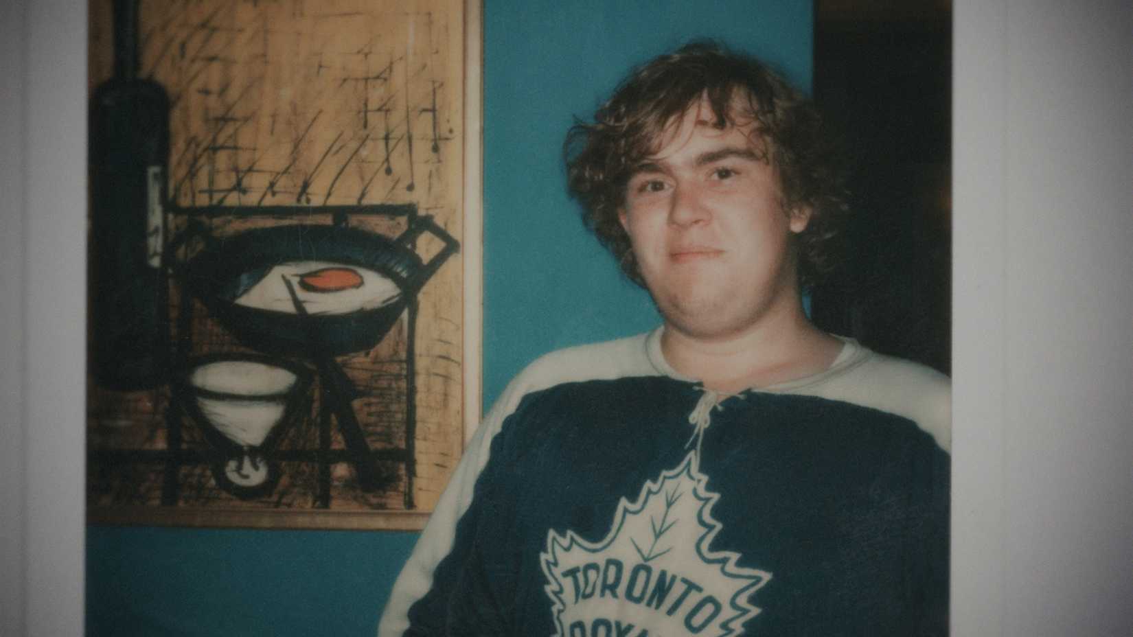 An old photo of a young John Candy in a Toronto Maple Leafs jersey from John Candy: I Like Me.