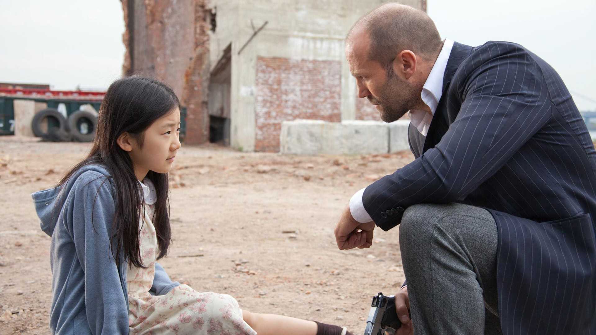Jason Statham and Catherine Chan in Safe