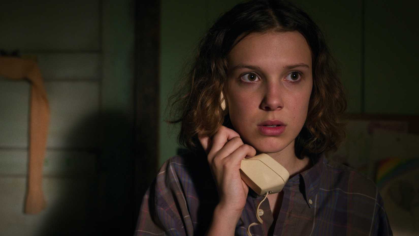 Millie Bobby Brown as Eleven in Stranger Things