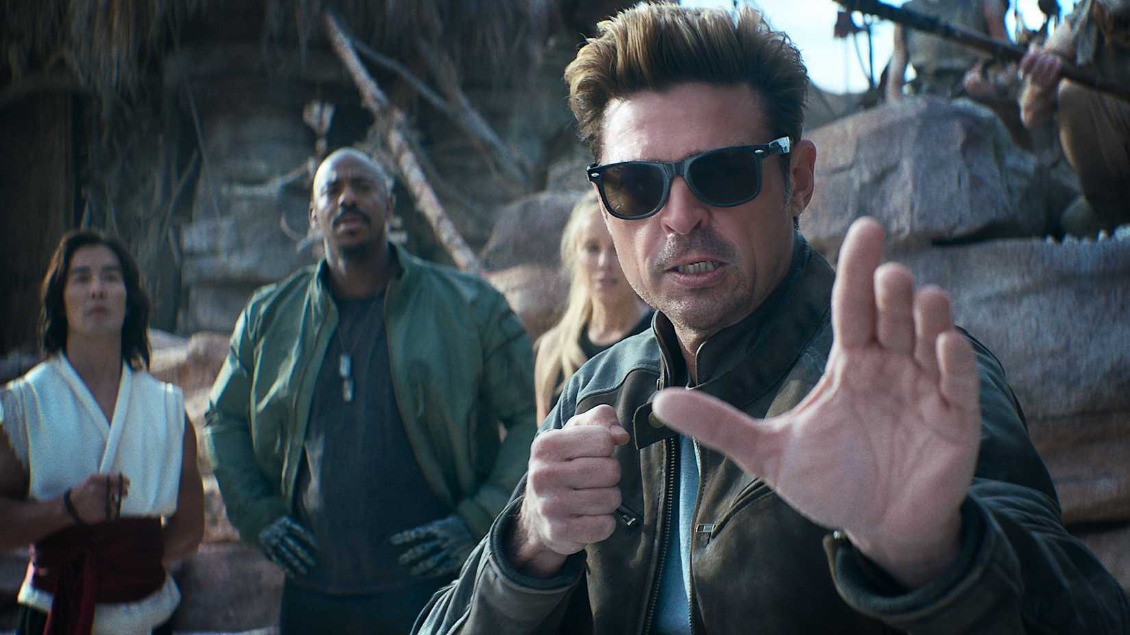 Ludi Lin's Liu Kang, Mehcad Brooks' Jackson 'Jax' Briggs, Jessica McNamee's Sonya Blade, and Karl Urban's Johnny Cage in Mortal Kombat II