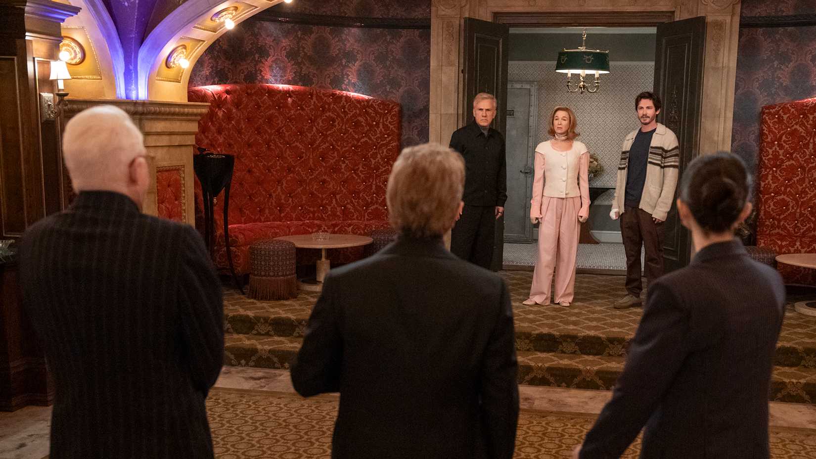 The backs of the trio in Only Murders in the Building facing the billionaire trio.