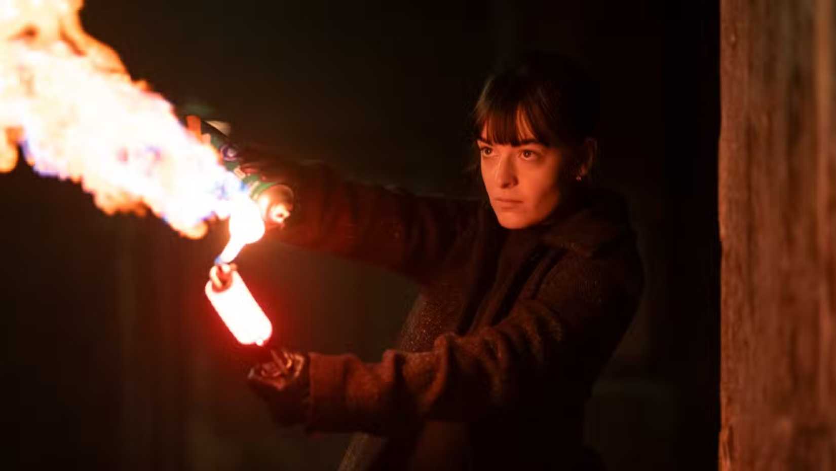 Doris lights a torch in Talamasca: The Secret Order