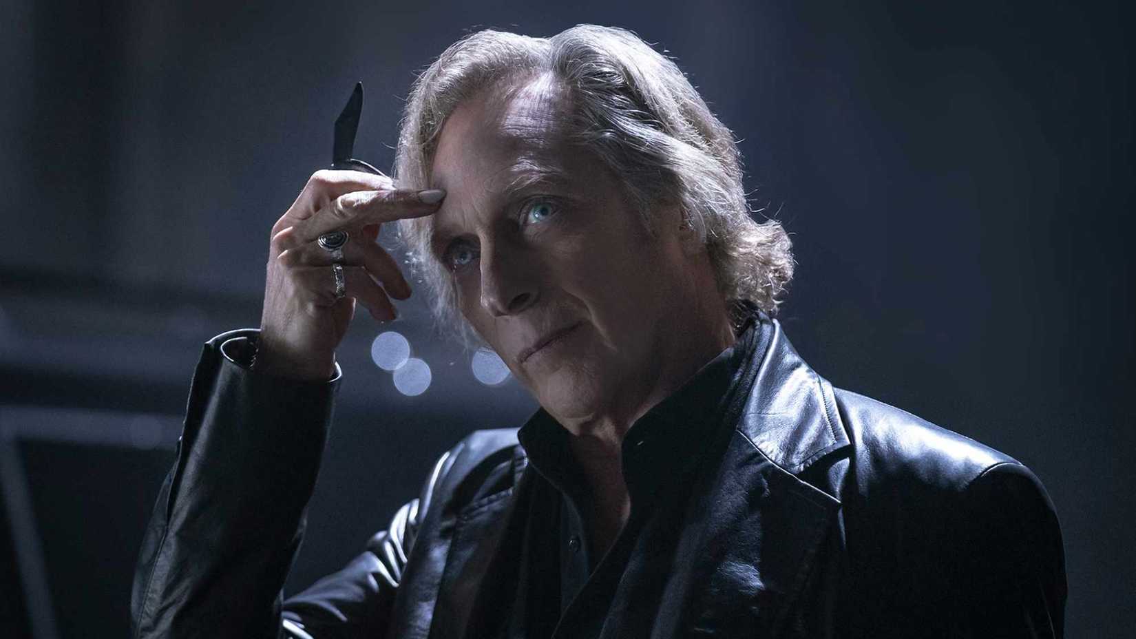Jasper holds a small blade in Talamasca: The Secret Order