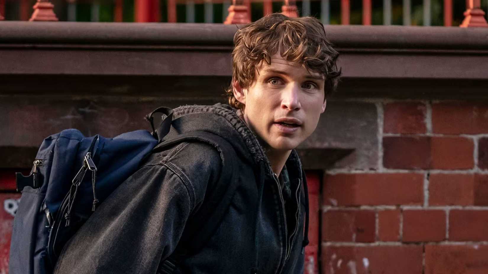 Guy sports a backpack in Talamasca: The Secret Order