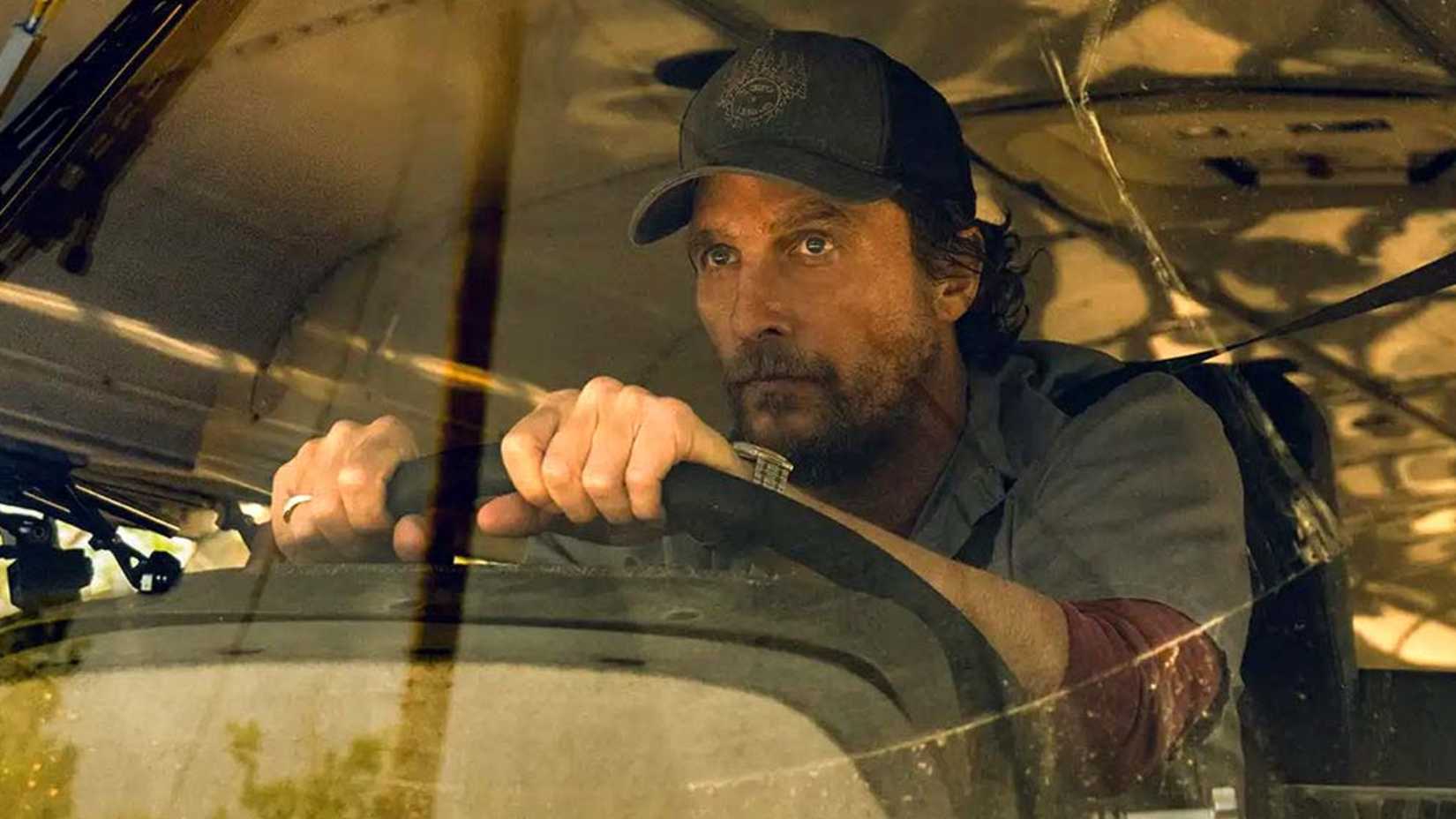 Kevin grips the wheel in The Lost Bus