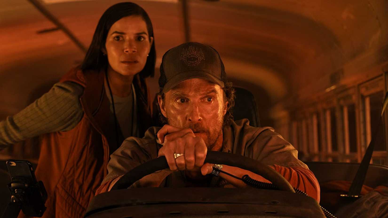Mary stands behind Kevin on the bus in The Lost Bus