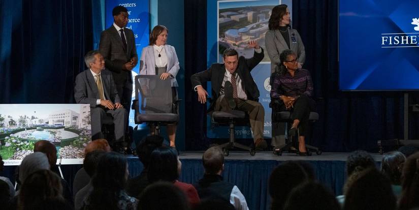 Tim Robinson falls out of his chair in front of a crowd in The Chair Company