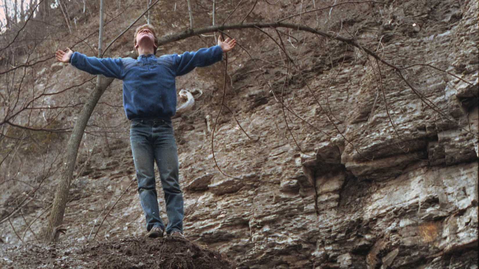 Chris stretches in the woods in True Haunting