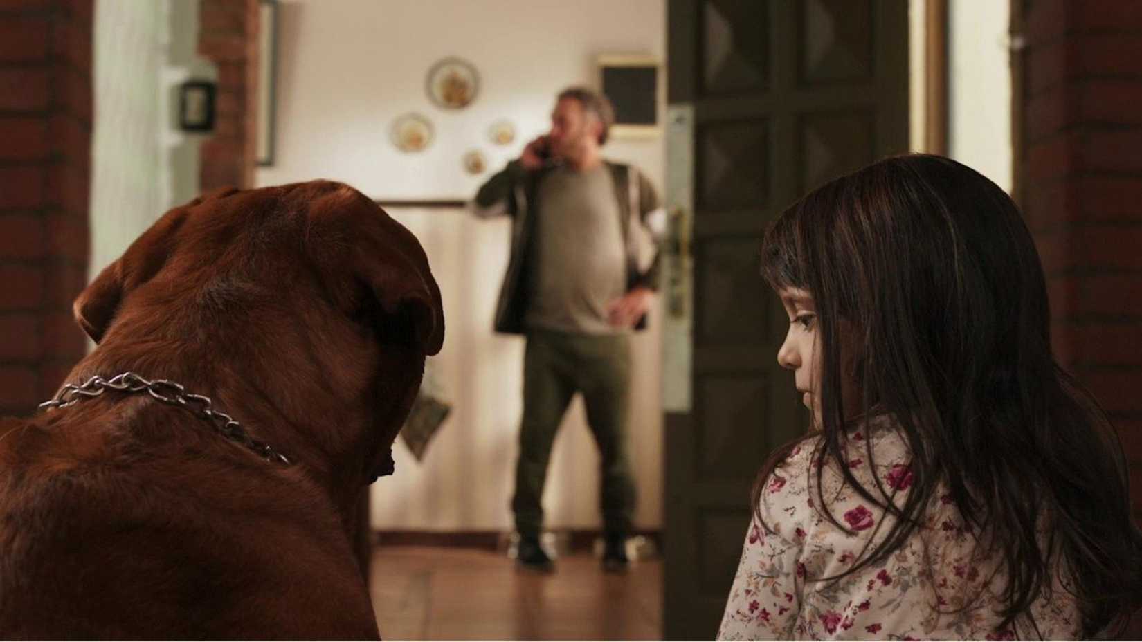 A girl and her dog in 'Where Evil Lurks' (2023)