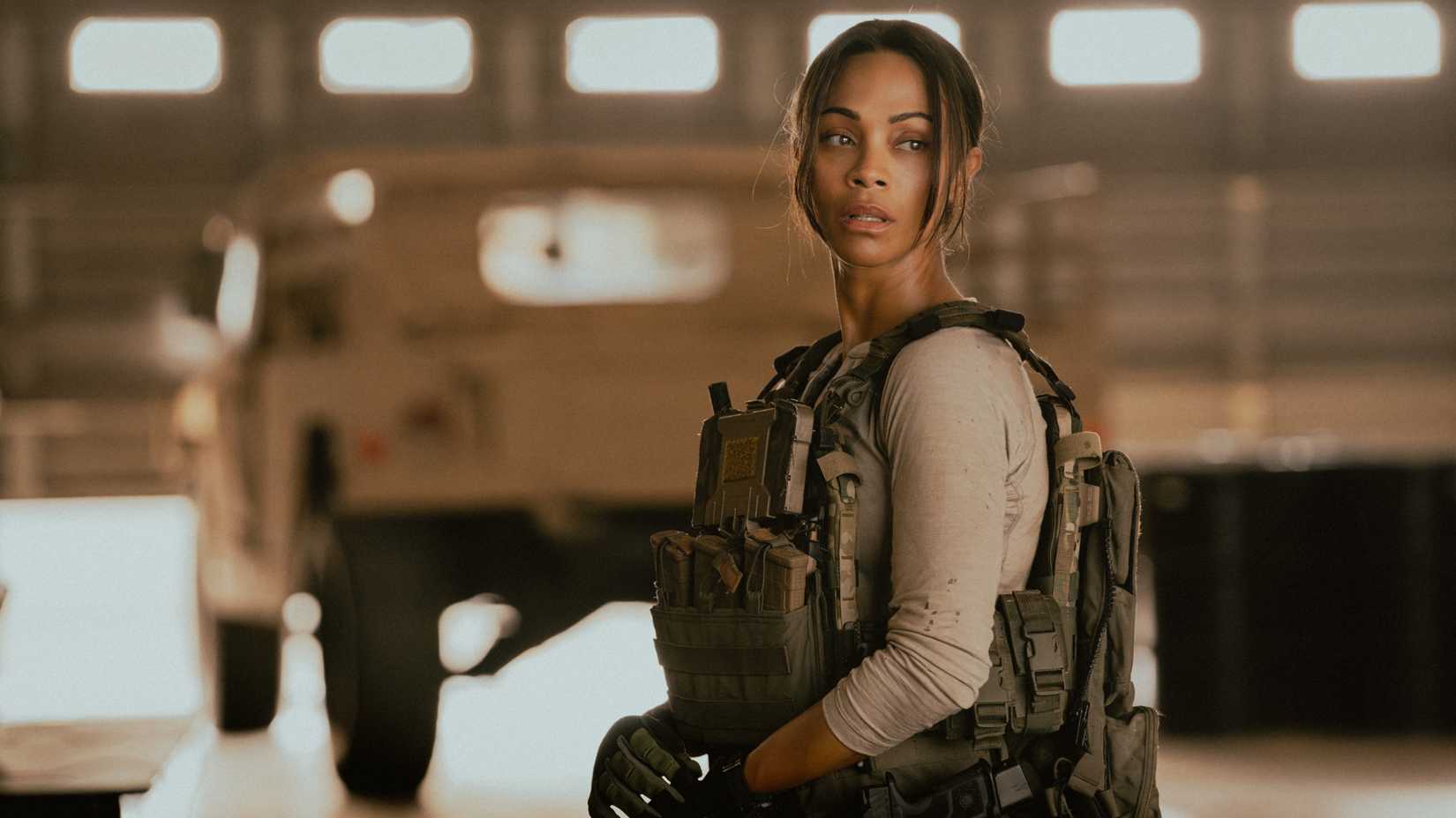 Zoe Saldana in Lioness wearing tactical military gear