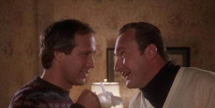Chevy Chase and Randy Quaid talking in National Lampoon's Christmas Vacation