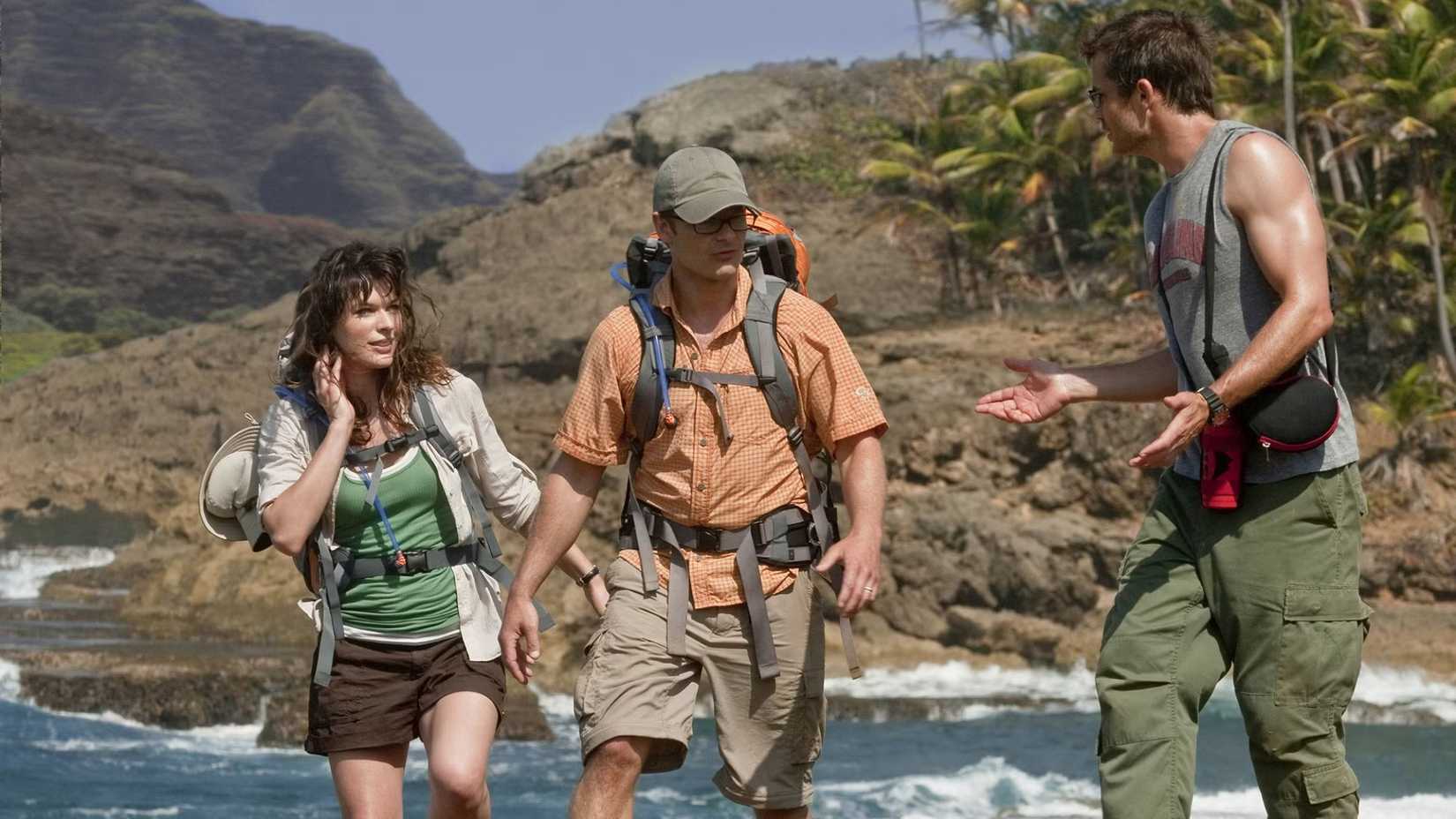 Cydney, Cliff, and Nick hike a cliff in A Perfect Getaway