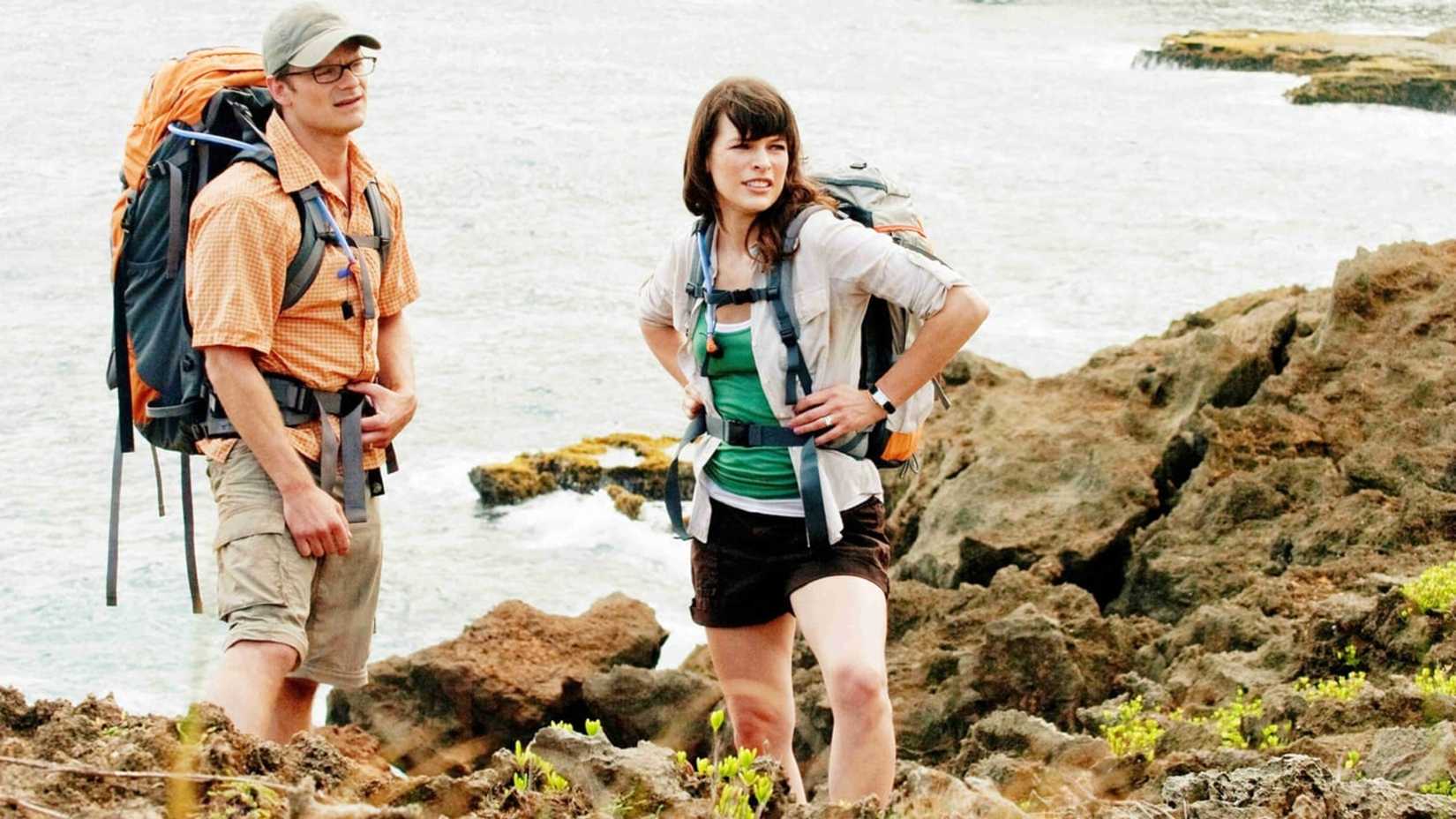 Cliff and Cydney pose on the rocks in A Perfect Getaway