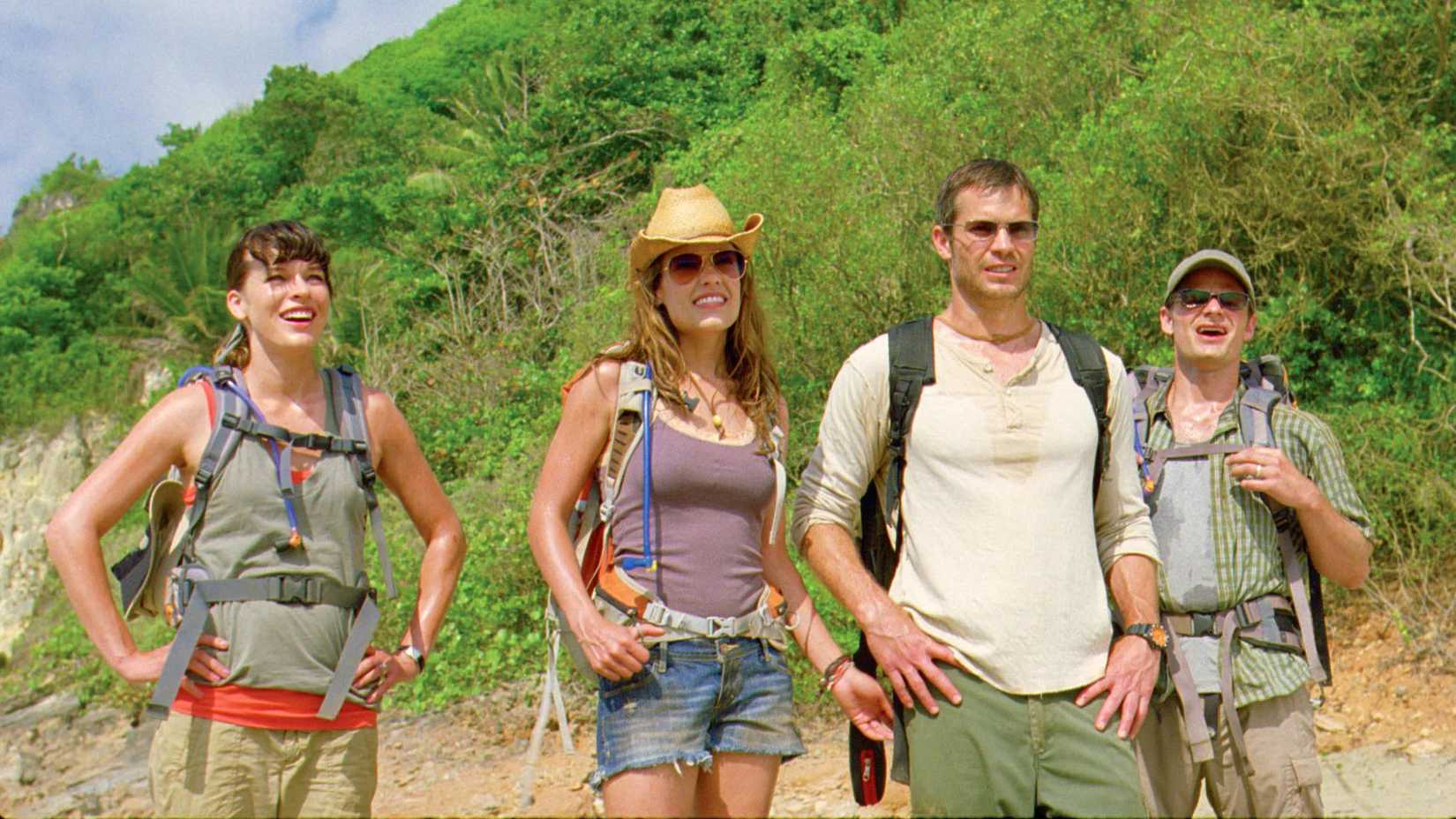 Four hikers pose in Hawaii in A Perfect Getaway