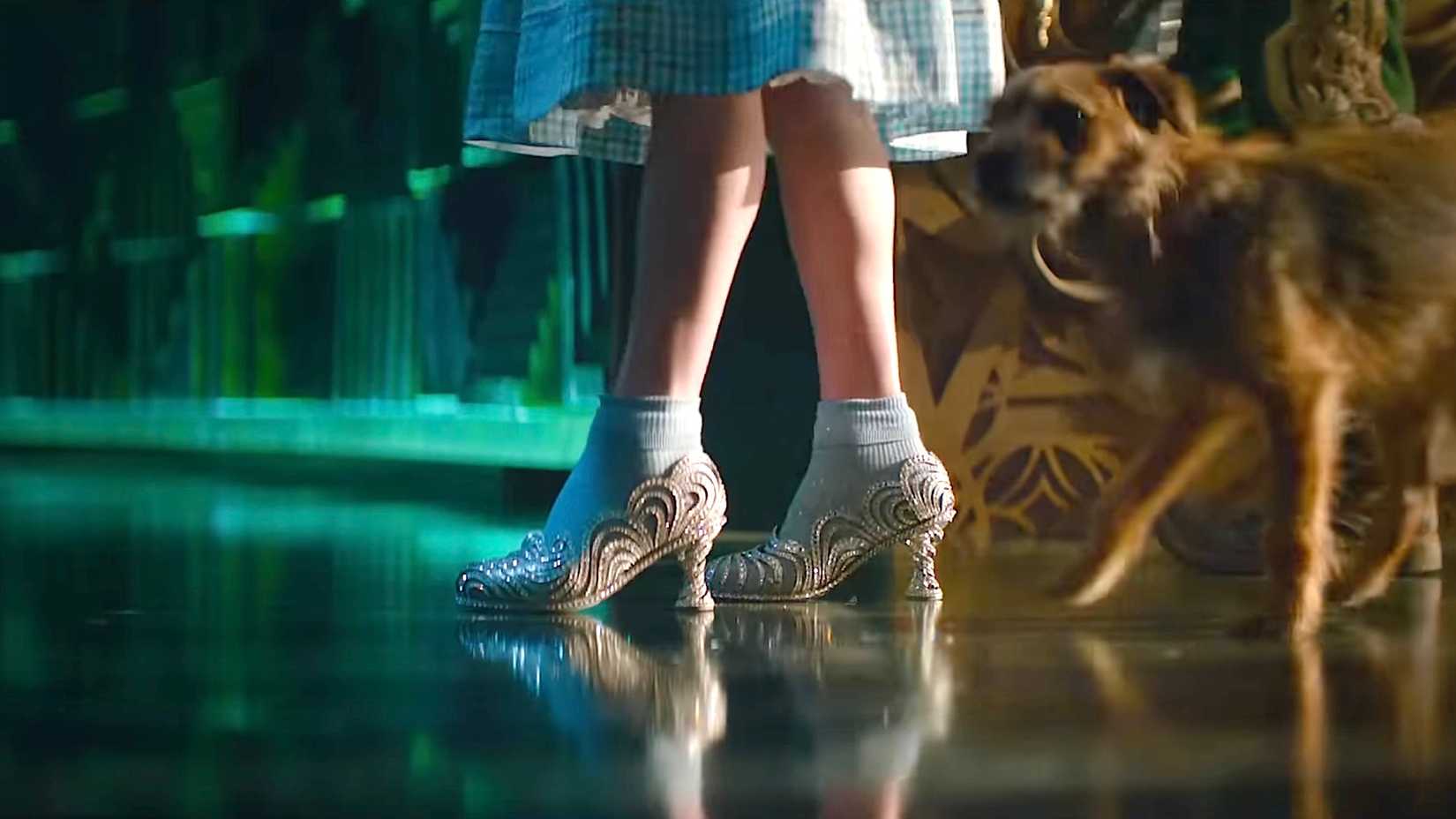 Dorothy stepping before the Wizard of Oz in her silver shoes in 'Wicked: For Good'