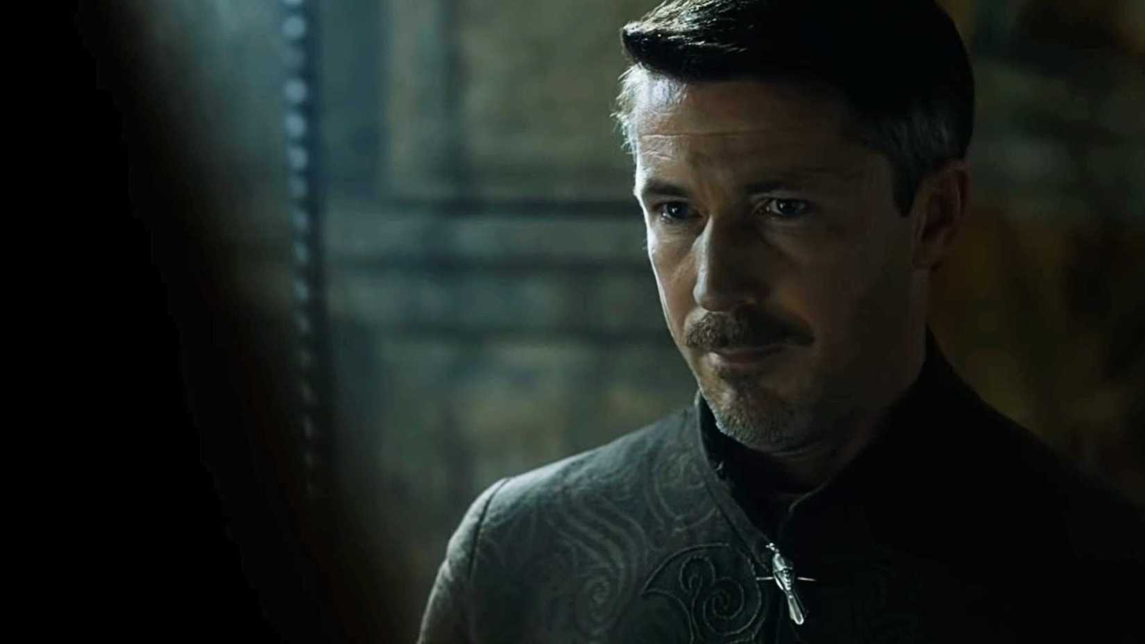 Peter in the dark looking mischievous in Game of Thrones.