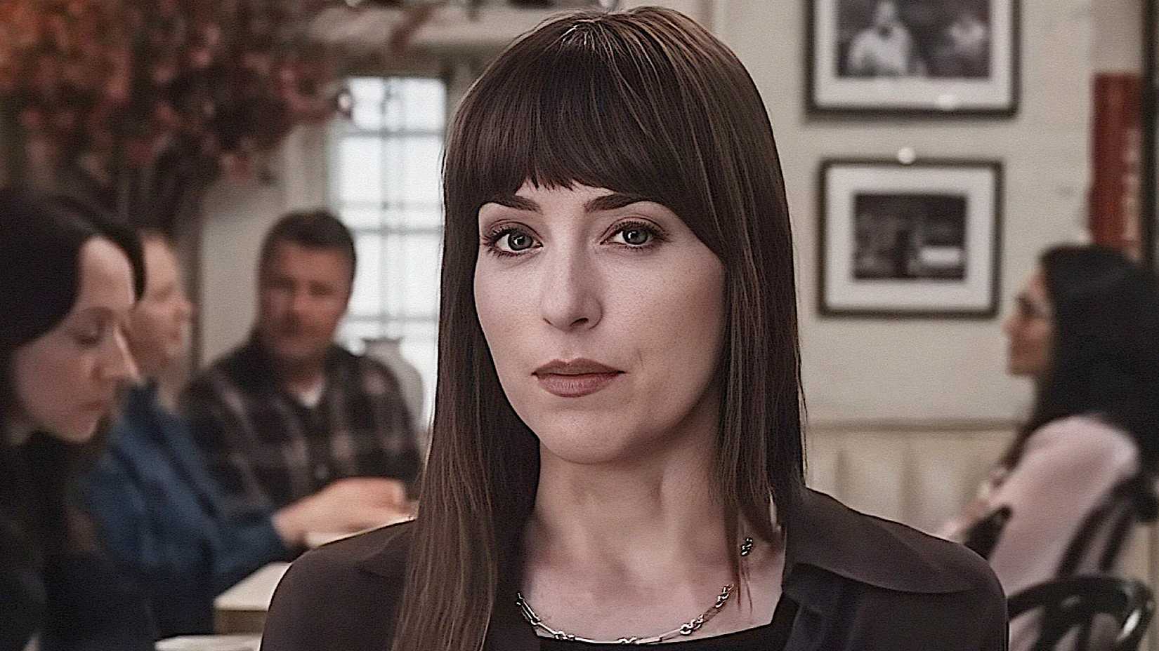 Dakota Johnson at a Table in Materialists