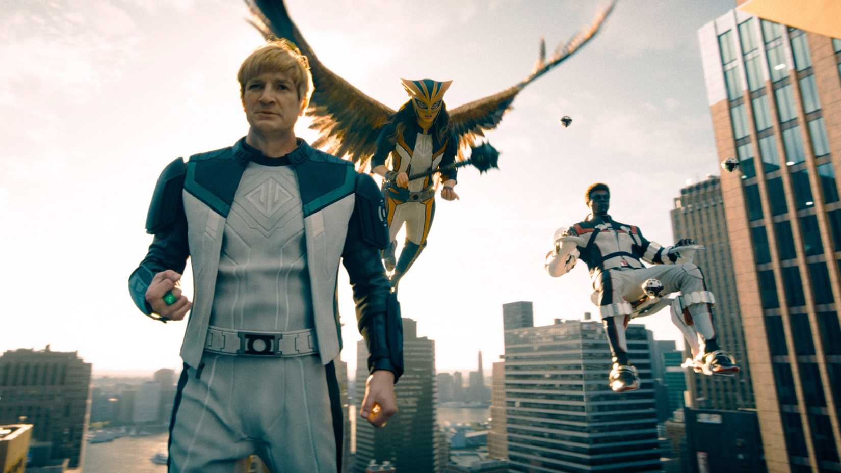 Nathan Fillion, as Guy Gardner, Isabela Merced, as Hawkgirl, Edi Gathegi, as Mr. Terrific in Superman.