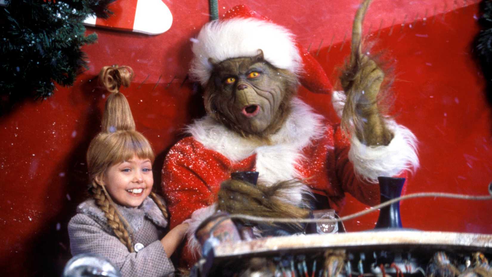 Taylor Momsen as Cindy Lou Who and Jim Carrey as the Grinch in How the Grinch Stole Christmas