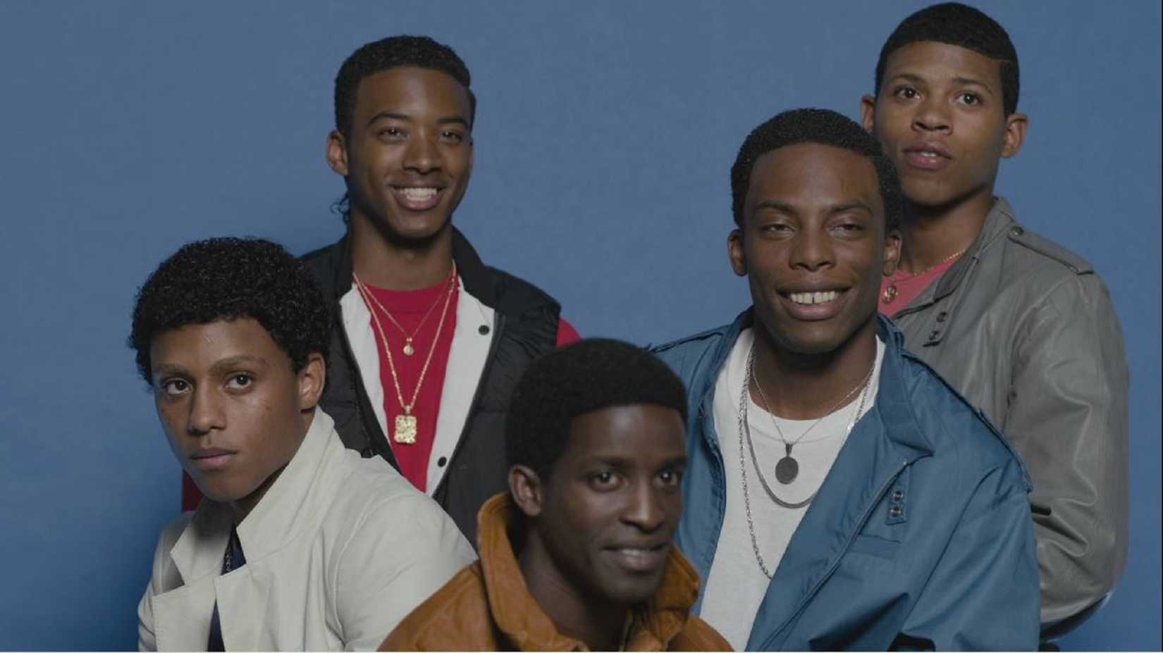 The grown cast of The New Edition Story smiling