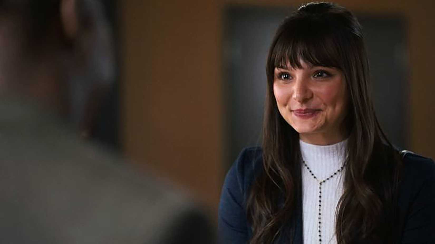 Mel smiling in Tracker.