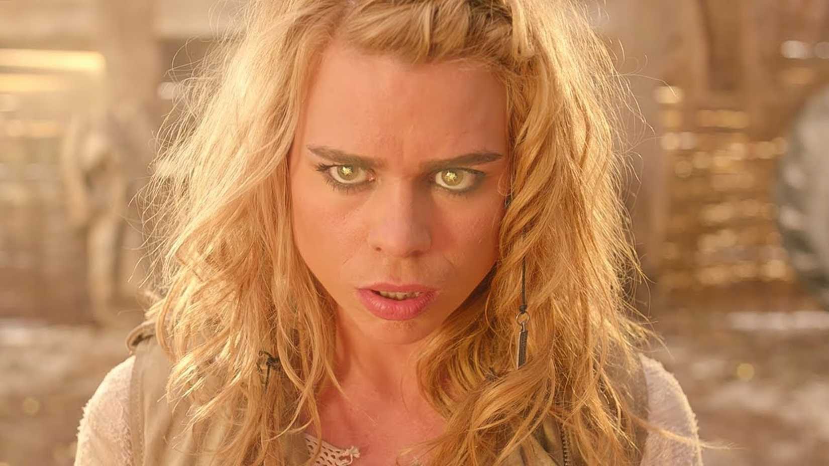 Billie Piper as the Moment, standing in the barn and staring up with glowing eyes, in Doctor Who.