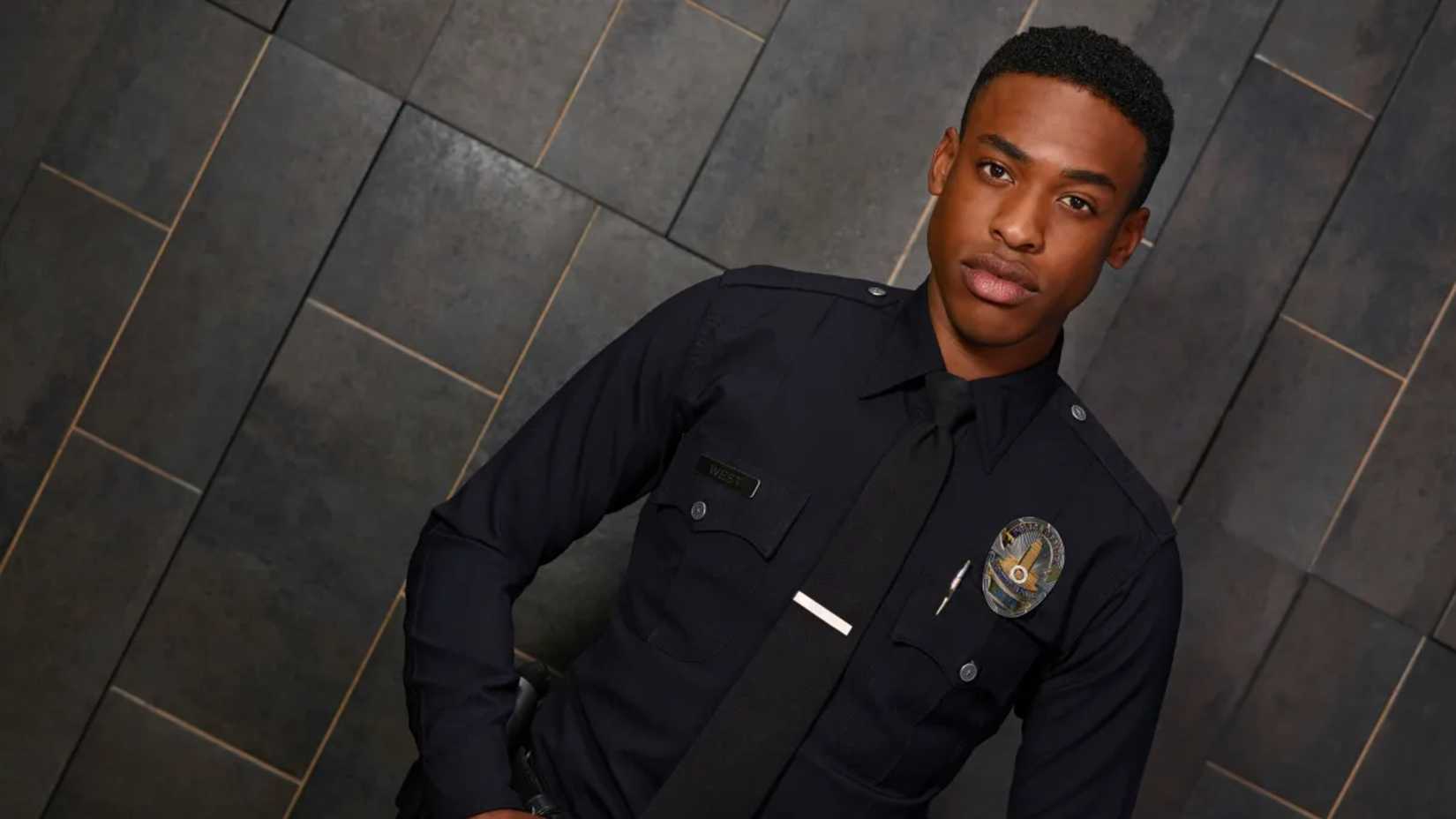 Jackson poses by a gray wall in The Rookie