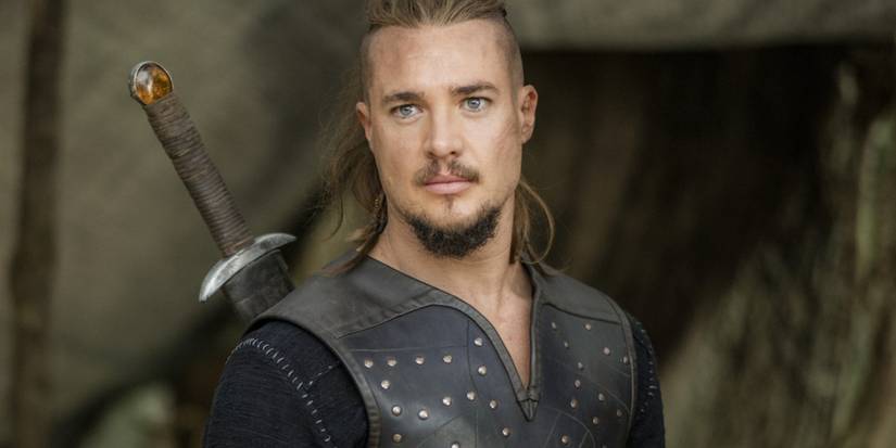 Alexander Dreymon as Uhtred of Bebbanburg staring into the distance in The Last Kingdom.