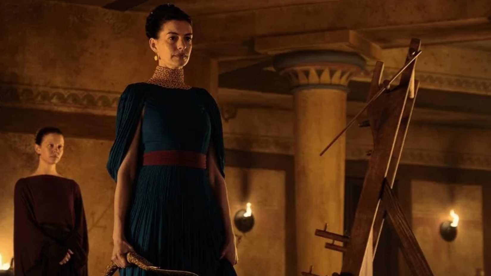 Penelope stands before Melantho in The Odyssey