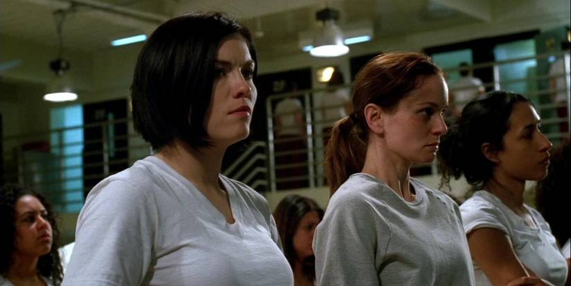 Sara dressed in plain clothing and lining up next to the other prisoners in Prison Break Season 4.