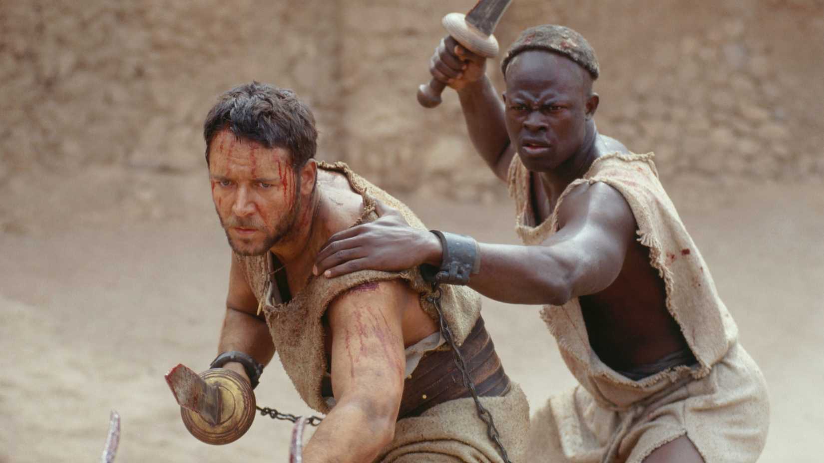 Maximus and Juba hold swords in Gladiator