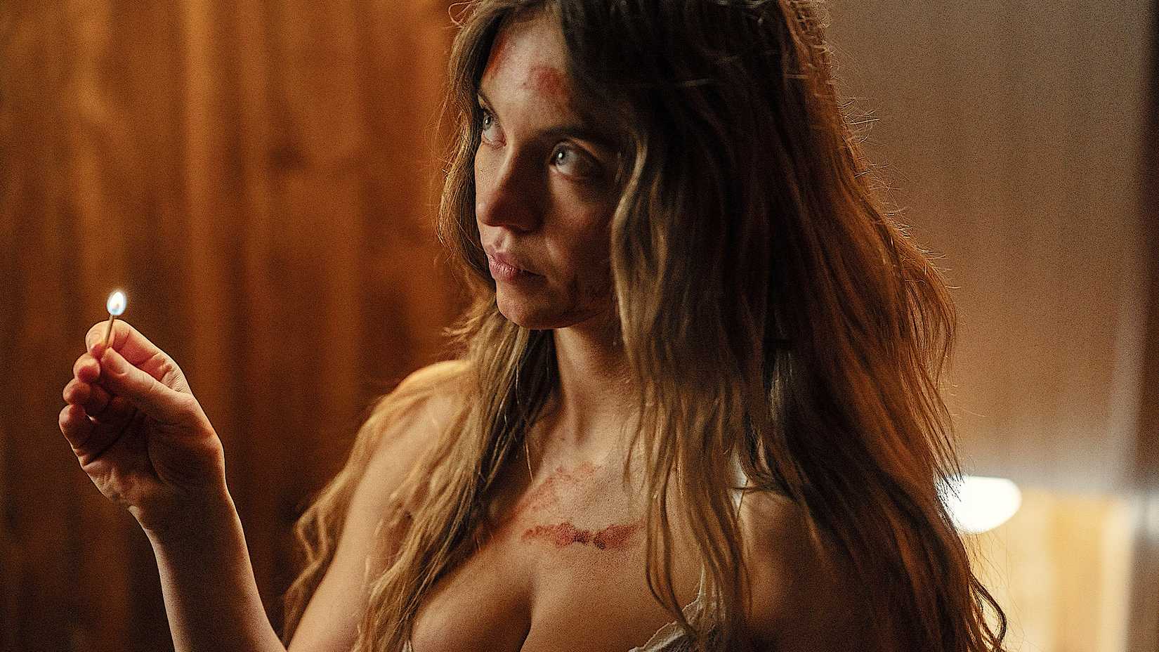 Sydney Sweeney With a Match in The Housemaid