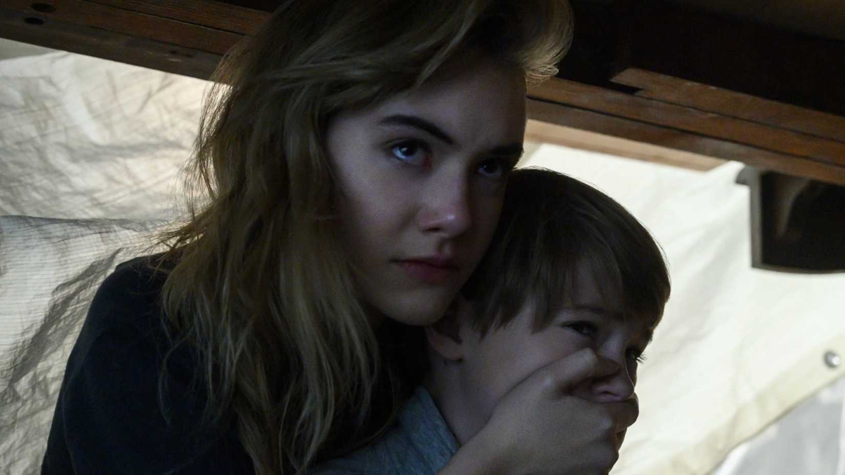 Emilia Jones standing with Jackson Robert Scott in Locke & Key