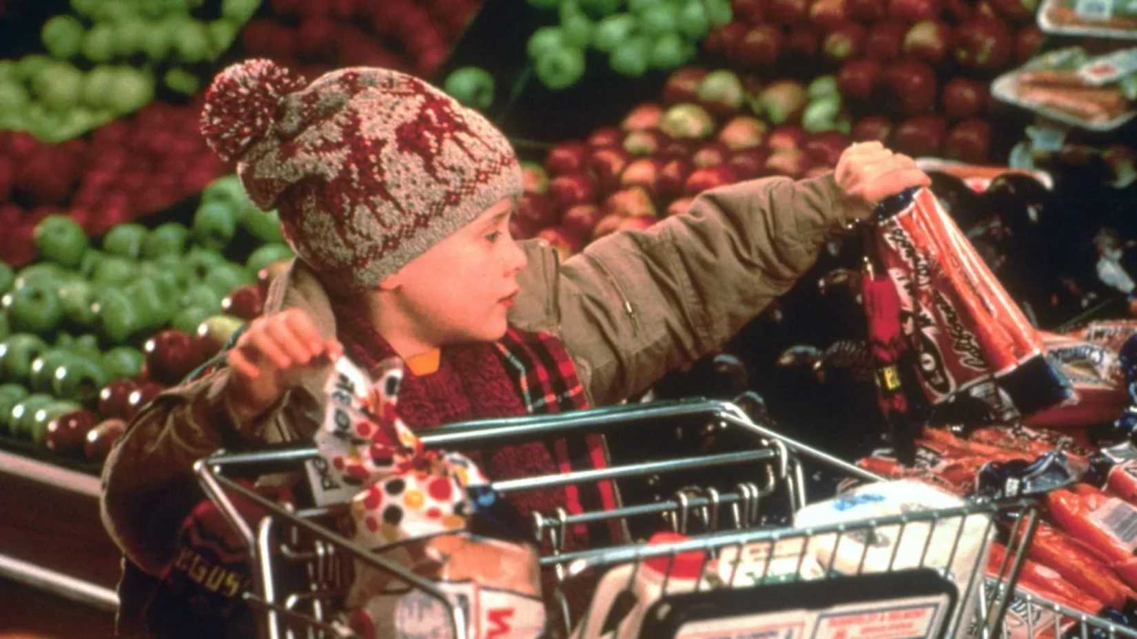 Macaulay Culkin in Home Alone getting groceries