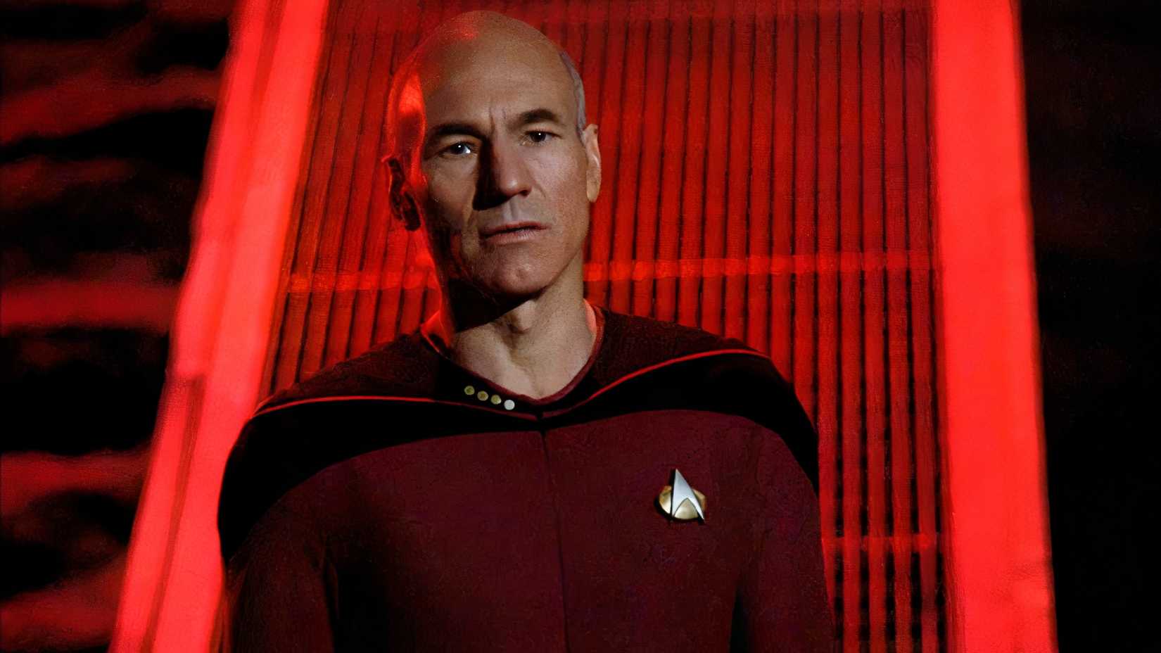 Captain Picard in front of a red background