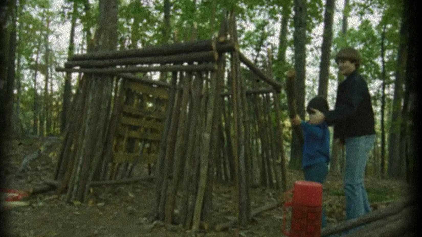 A flashback of young Will and Jonathan building Castle Byers in Stranger Things.