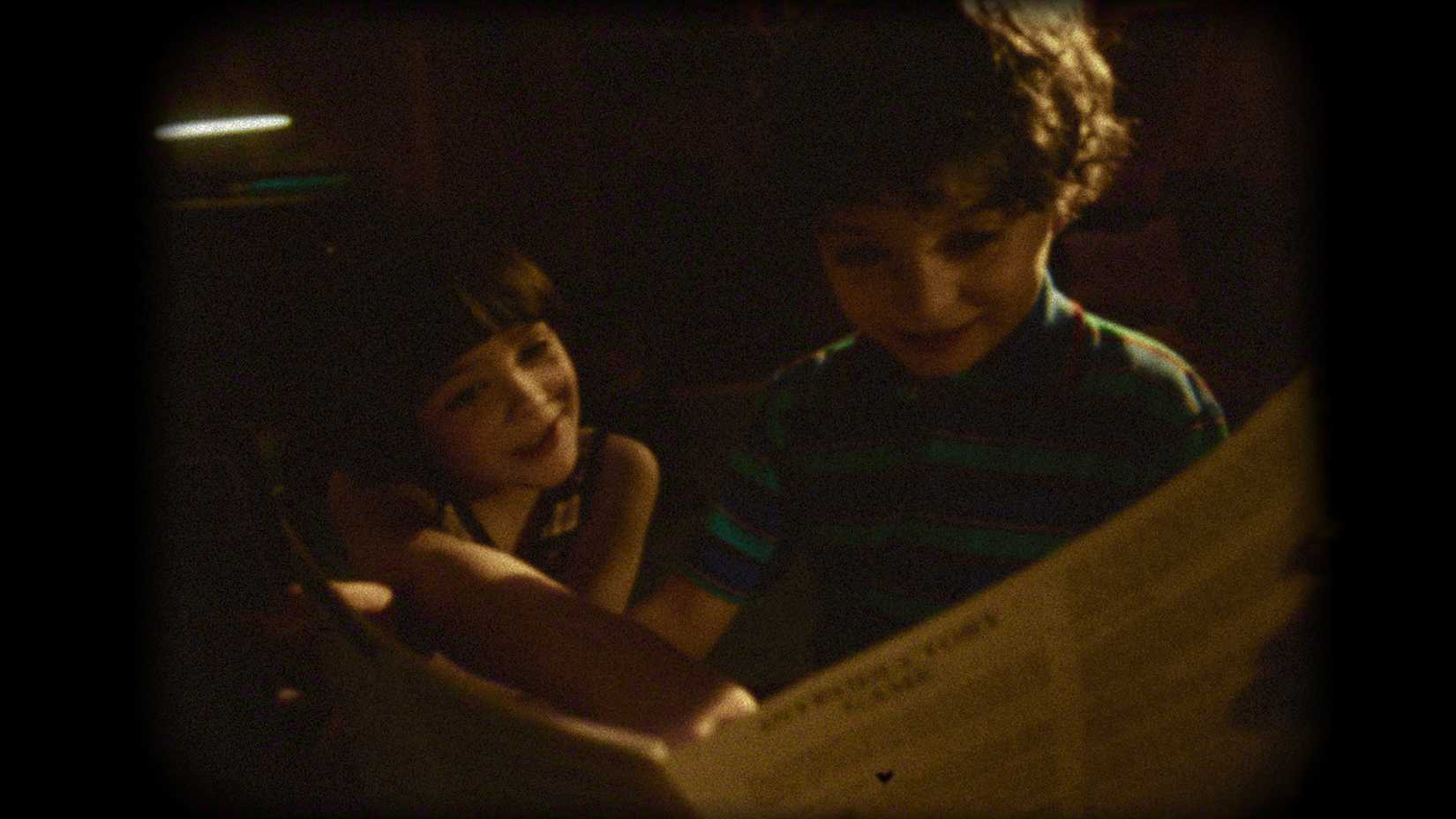 A flashback of a young Will with Mike in Stranger Things.