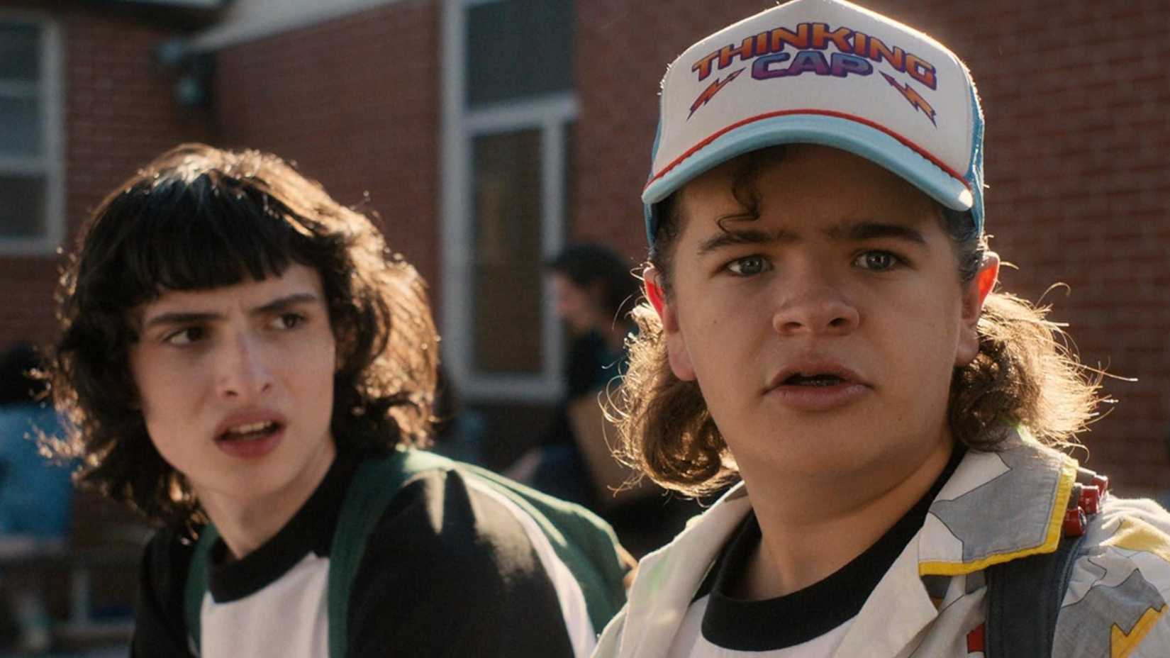 Mike (Finn Wolfhard) and Dustin (Gaten Matarazzo) looking serious in Stranger Things