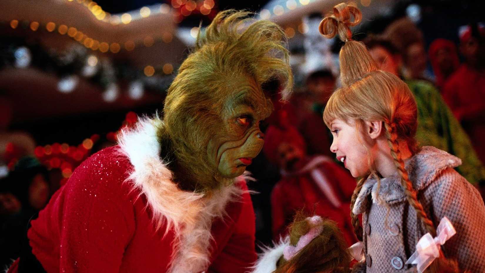 The Grinch talking to Cindy Lou in How the Grinch Stole Christmas.
