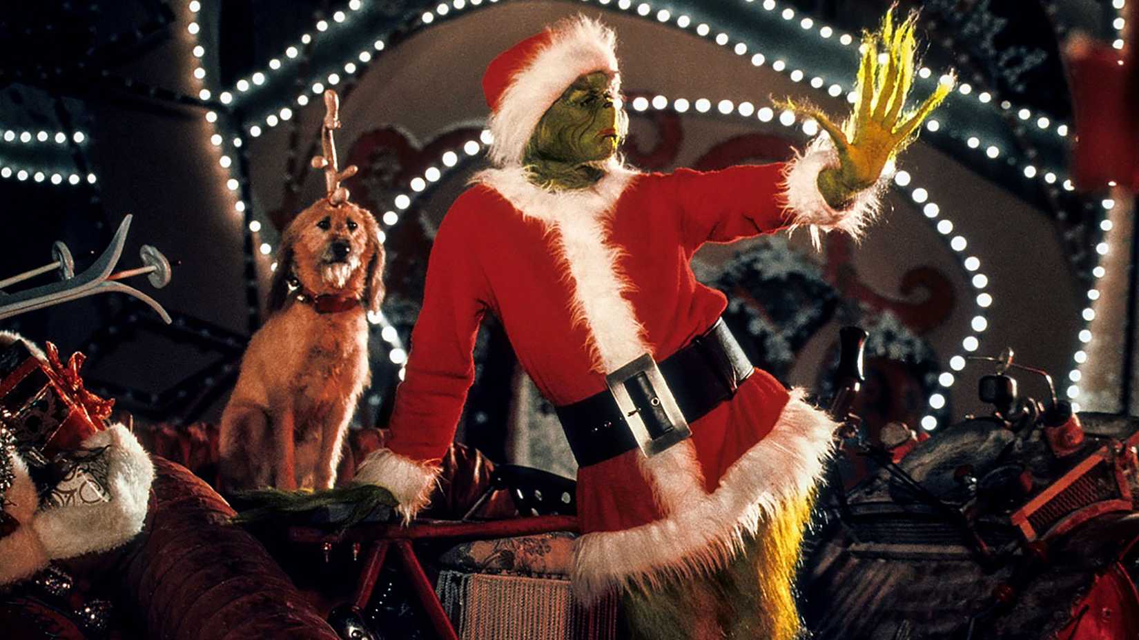 The Grinch looking at his hand in How the Grinch Stole Christmas.