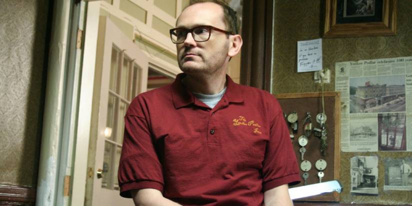 Luke (Pat Healy) looking at something in The Innkeepers