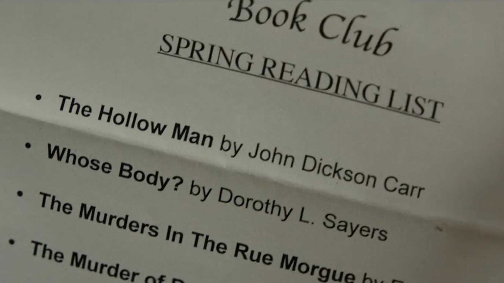 Martha's book club selections in Wake Up Dead Man