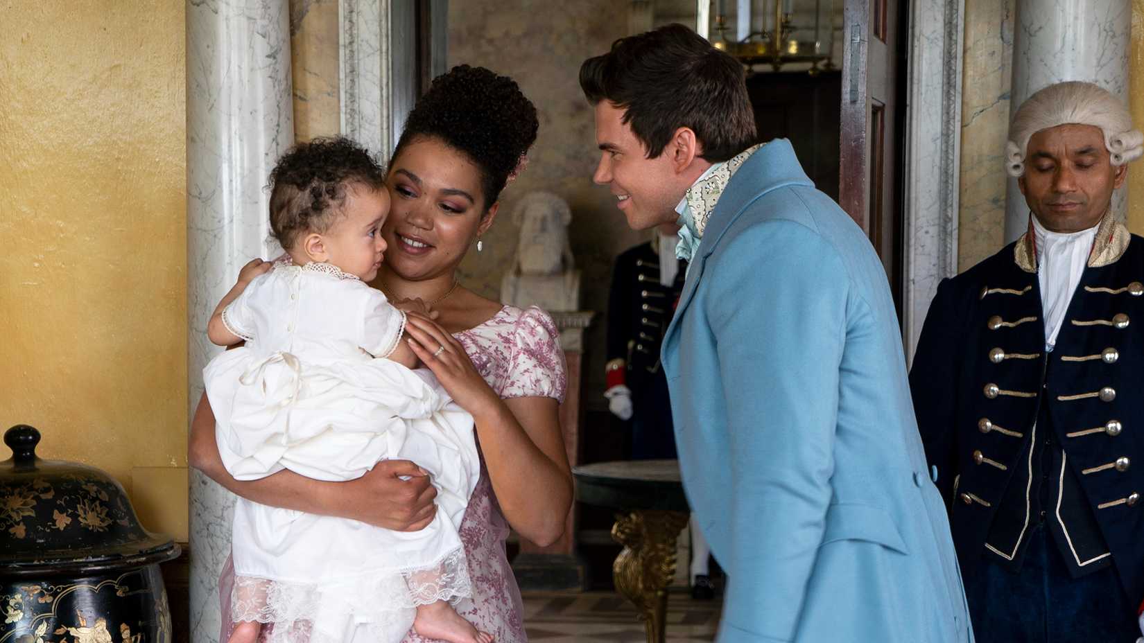 Marina introducing one of her babies to Colin as he visits her home in Bridgerton.