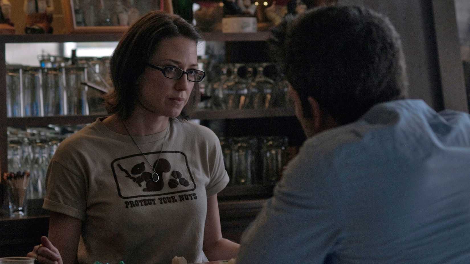 Margo and Nick talking in Gone Girl.