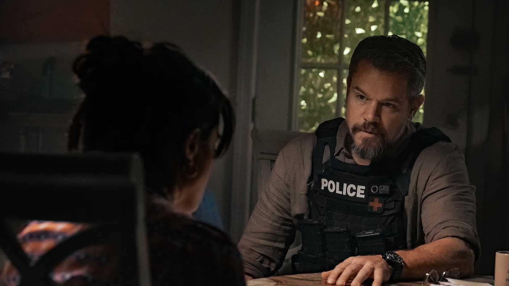 Matt Damon talking to a suspect in 'The Rip"