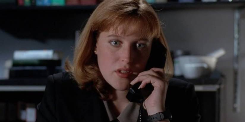 Scully (Gillian Anderson) talking on the phone on The X-Files